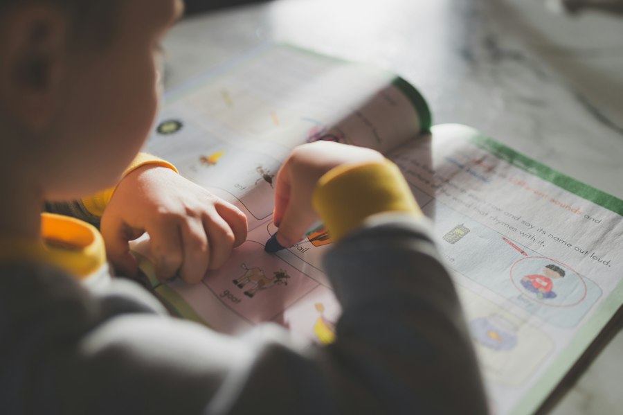 Child practicing Arabic writing in a lesson